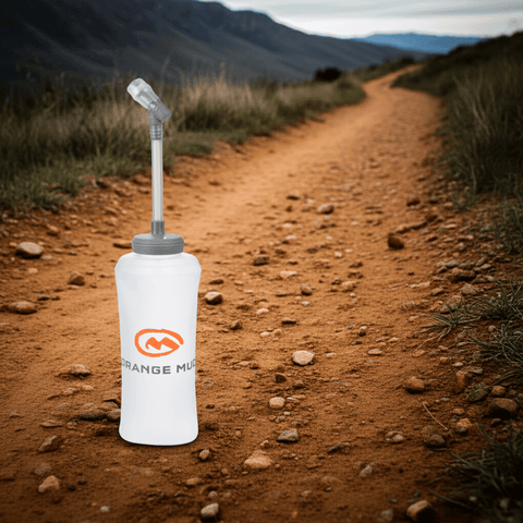 Orange Mud UltraFlask 500 ml / 17 oz soft flask on a trail, 1 flask