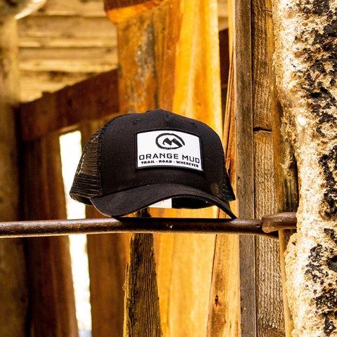 Orange Mud 5-Panel Black Trucker Hat front view