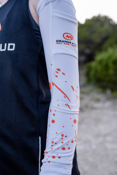 White Arm Cooler sleeve worn on a runner's arm