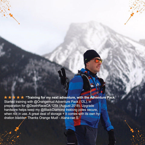 Athlete in the snowy mountains with the Adventure Pack 20L, with a customer review